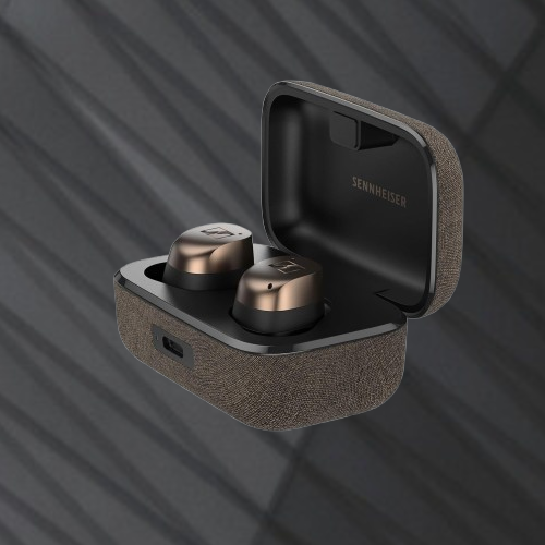 A pair of Sennheiser wireless earbuds inside an open charging case, highlighting their sophisticated design and premium build quality.